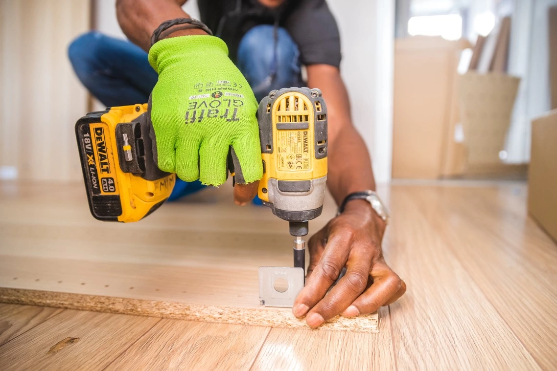 man working with wood